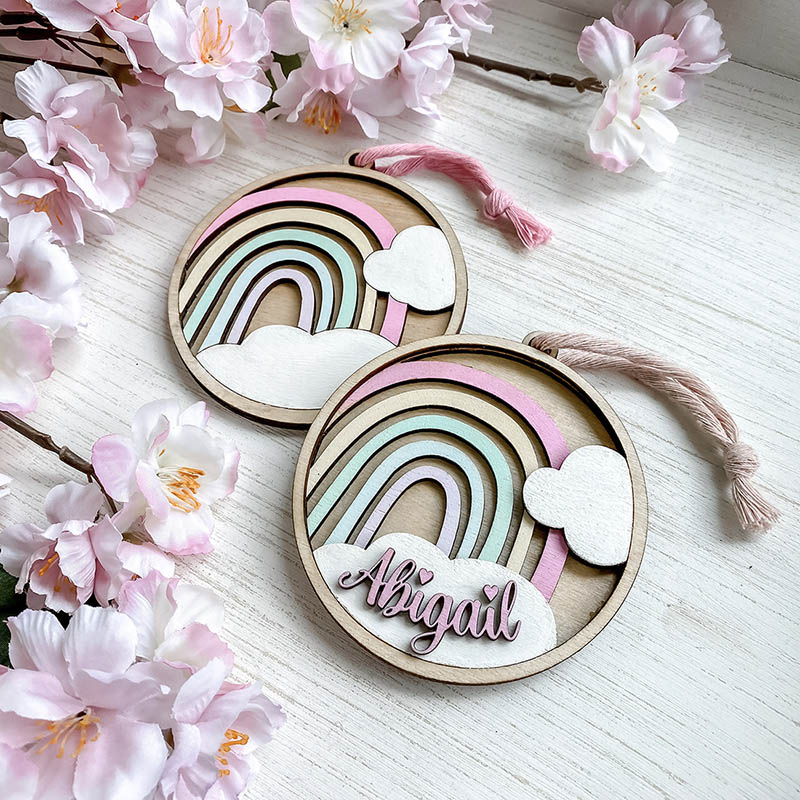 无期徒刑一般是多少年 laser cut wooden ornaments with rainbows and colorful names
